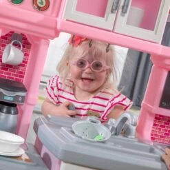 Step2 Great Gourmet Play Kitchen With Storage Bins And Accessory Play Set – Pink -Step2 04619da6 2c0a 4b3c be76 e032f2c9392c 4.7b9298f5f0e05b370f12cafc8519326a scaled 1