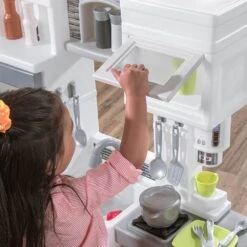 Step2 Downtown Delights Play Kitchen With 24 Piece Accessory Play Set -Step2 73bbd081 60ab 46ec 8359 c1d8864d0eda 1.918399077cc1ca4ee86aae97bb5ff8fc