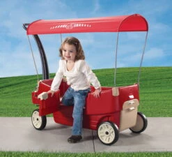 Step2 All Around Canopy Wagon Red Kids Wagon With Canopy -Step2 9e8ba398 3656 4a62 bd5a 01035b913714 3.2e76699e25cc82e30edef4c3e94a4186 scaled 1