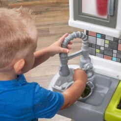 Step2 Contemporary Chef Brown And White Toddler Plastic Play Kitchen -Step2 b140c5fa 3bda 451d a583 11dd453cf99c 3.c5ad3fd725ce335ceba0d30e66e63834 scaled 1